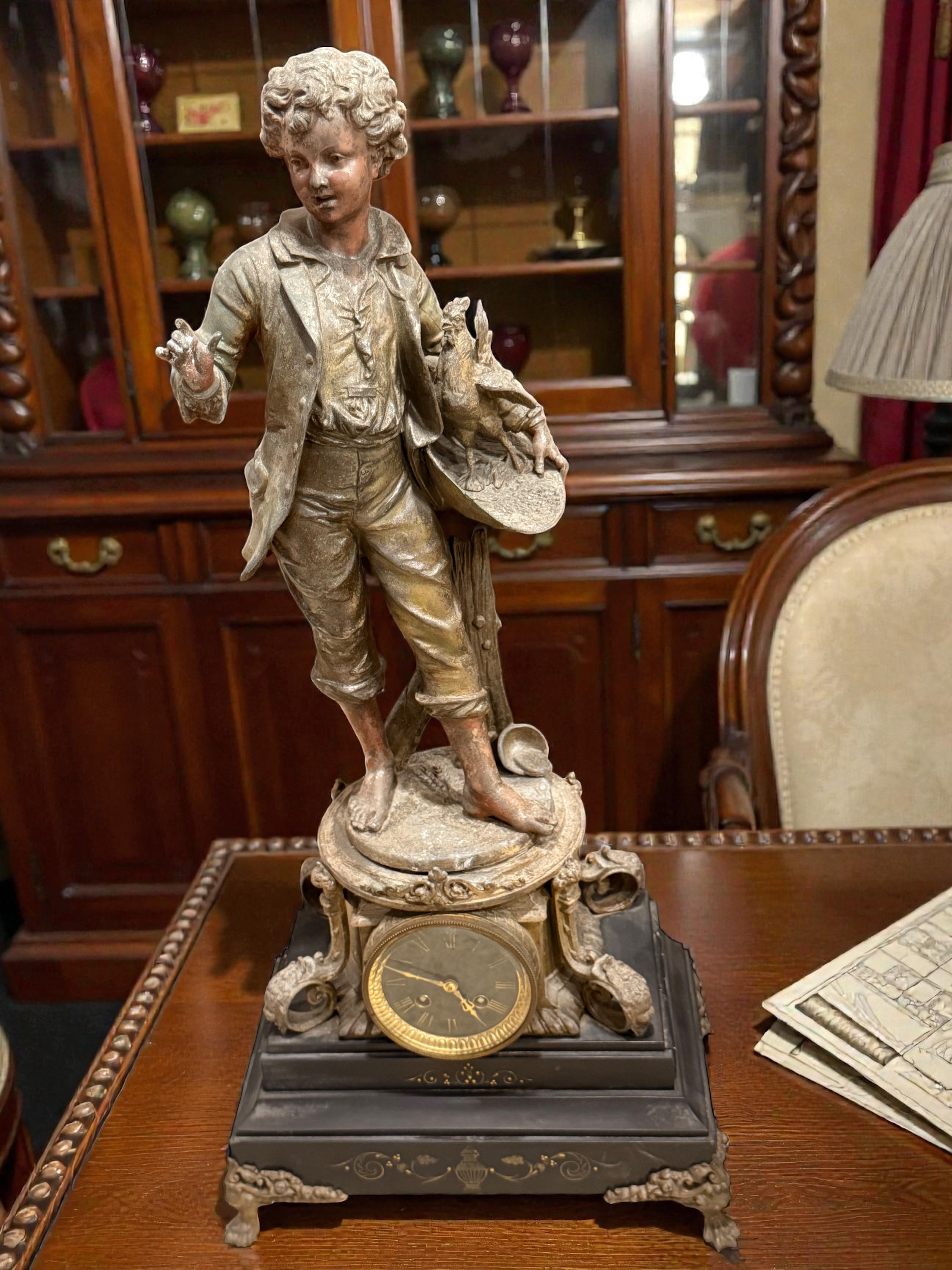 French Belle Époque Statue Lamp with Clock

Émile Bruchon – “Boy Holding a Nest”