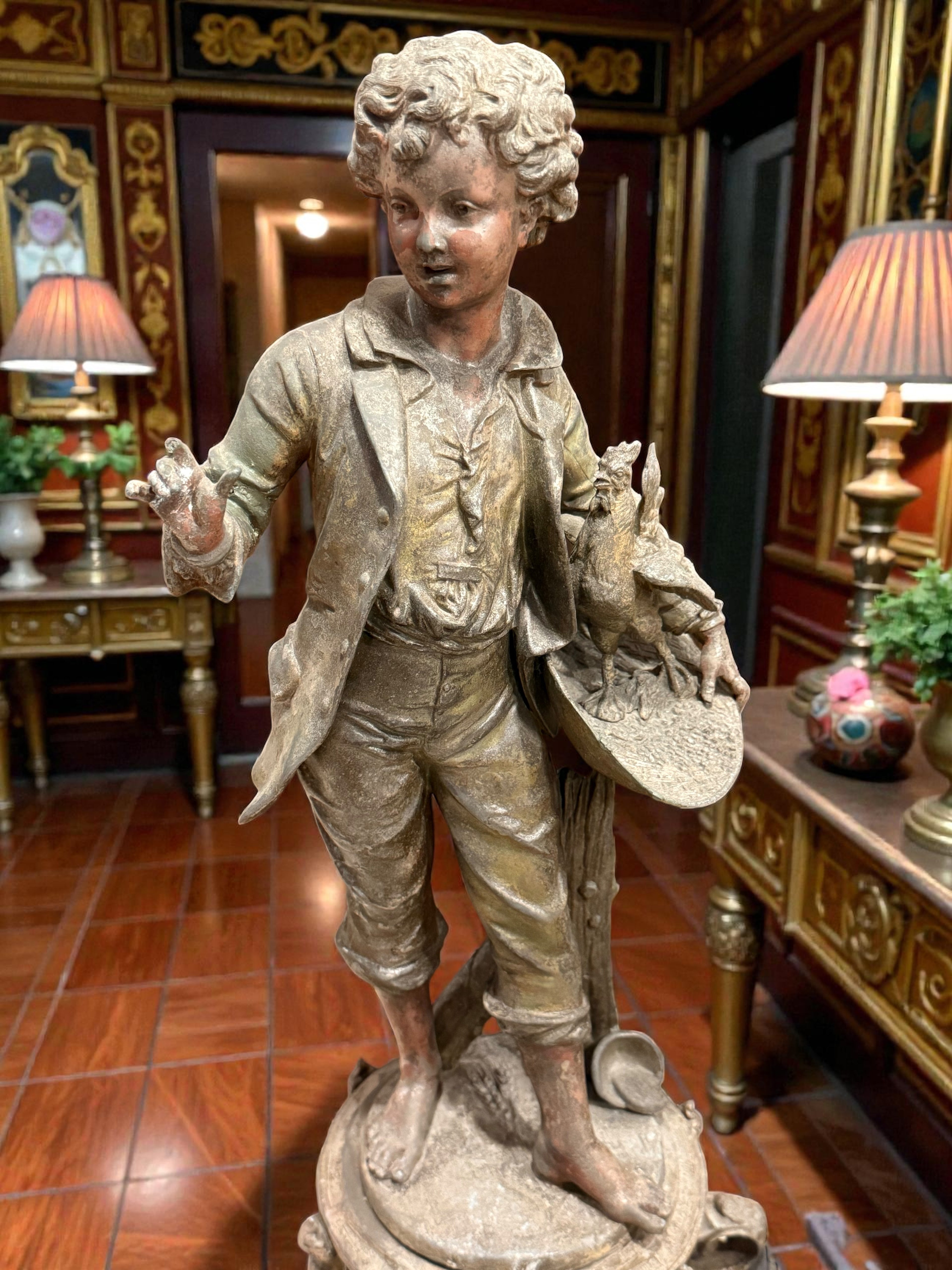 French Belle Époque Statue Lamp with Clock

Émile Bruchon – “Boy Holding a Nest”
